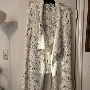 Chico Size 2 Sleeveless sweater. White with a mix of brown and black